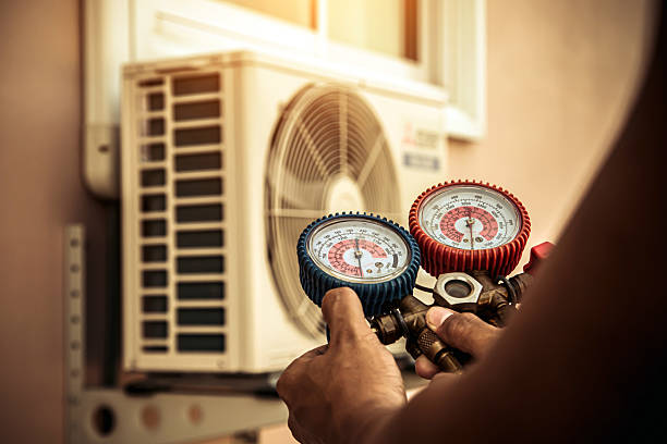 Professional Ac Installation technician working in Woodville, MS